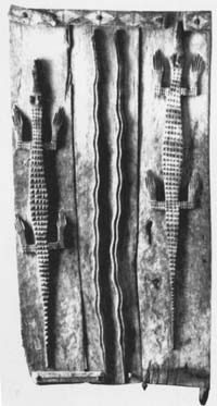 Crocodiles carved on a wooden door by Bamana people of Africa